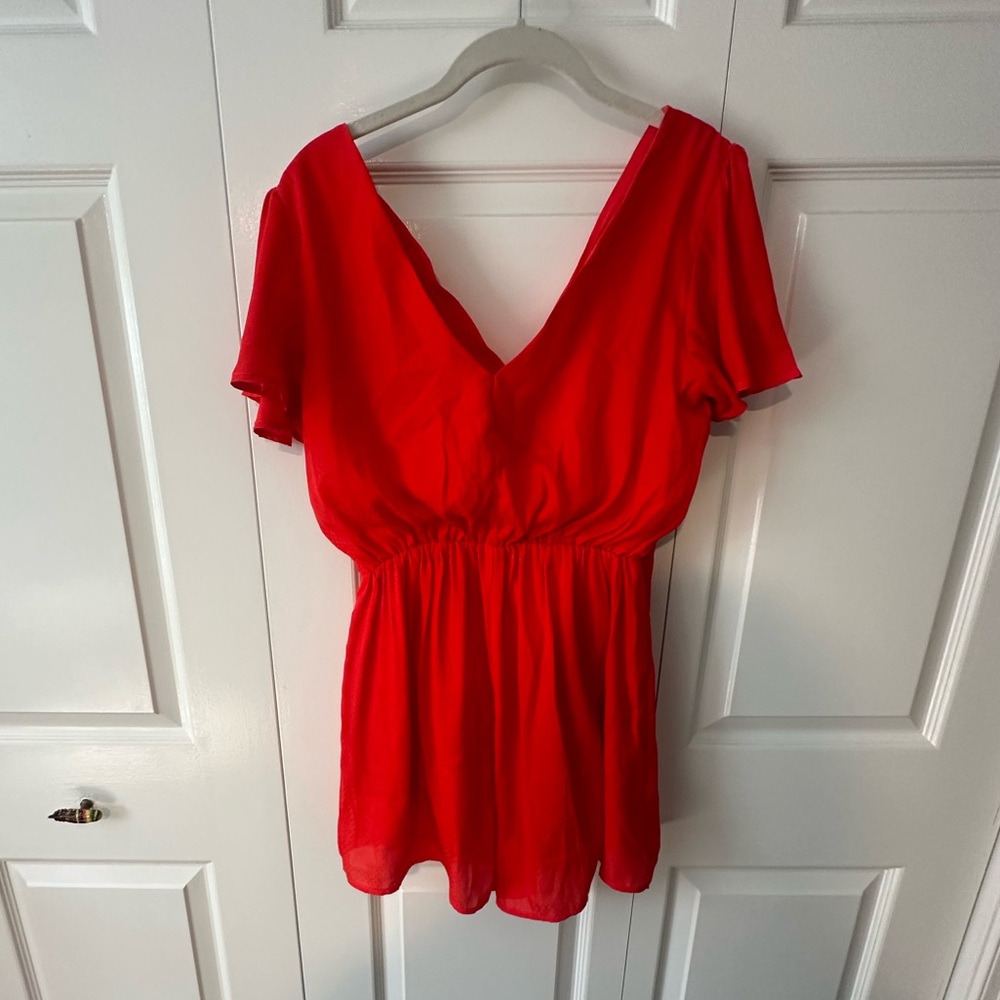 Red romper - super cute, just had some yarn pulls around buttons